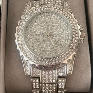 King Hoon silver watch with crystal accents